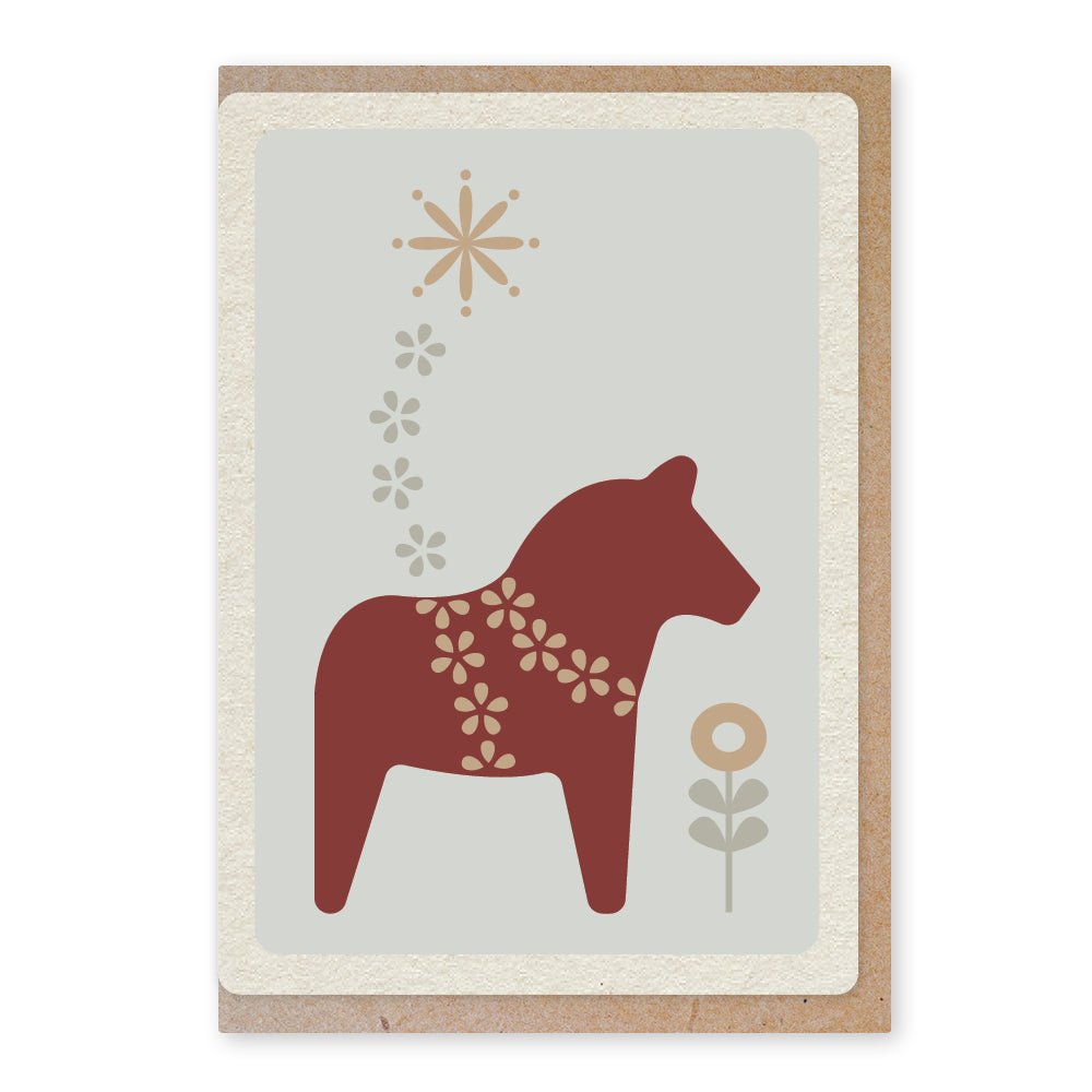 Een mooie duurzame enkele kaart met een Zweeds dalapaardje voor een Kerstgroet of een Nieuwjaarswens.